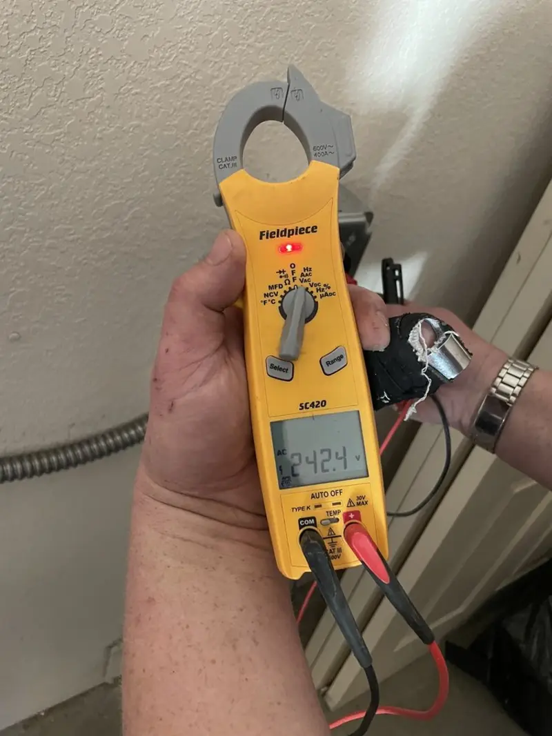 Voltage testing with clamp meter during Hot Tub / Pool Electrical Wiring in Frederick